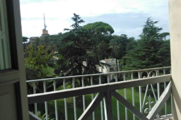 a bridge going over a wooden fence